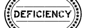 favorite_borderfilter_none Grunge black deficiency word oval rubber seal stamp on white background