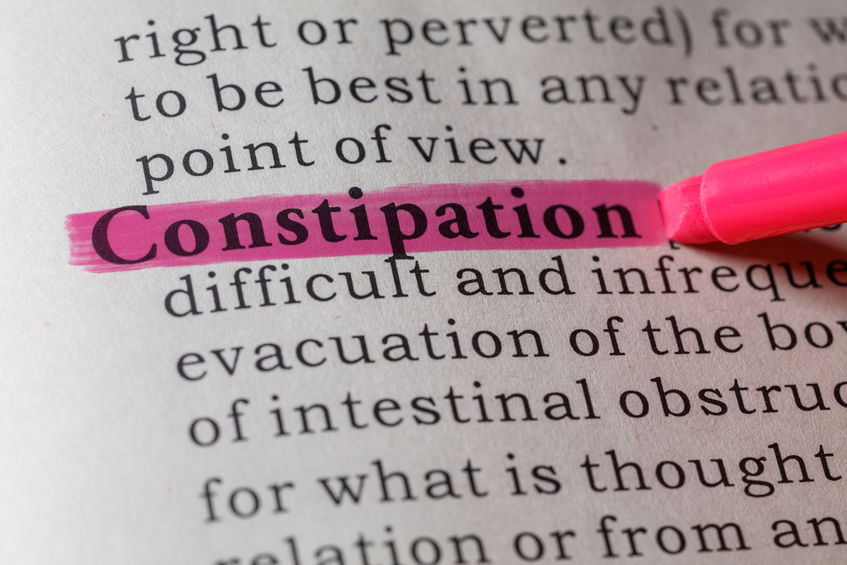 Dictionary definition of the word constipation highlighted in pink.