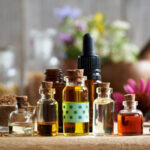 Selection of aromatherapy essential oil with myrrh, frankincense, echinacea and other herbs and flowers