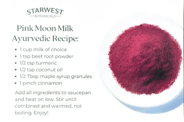 A printed recipe for Pink Moon Milk sits next to a bowl filled with bright pink beet root powder.